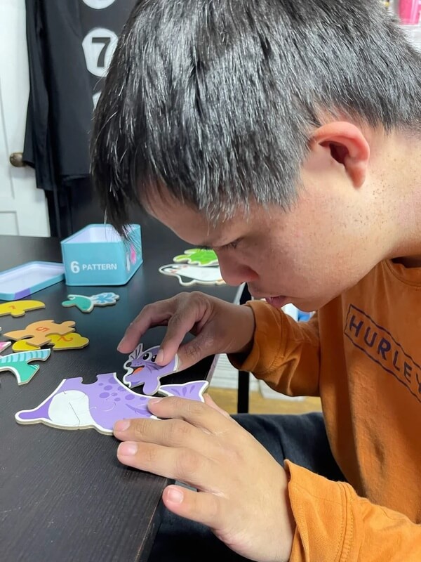 Adult day program participants in creative arts activity