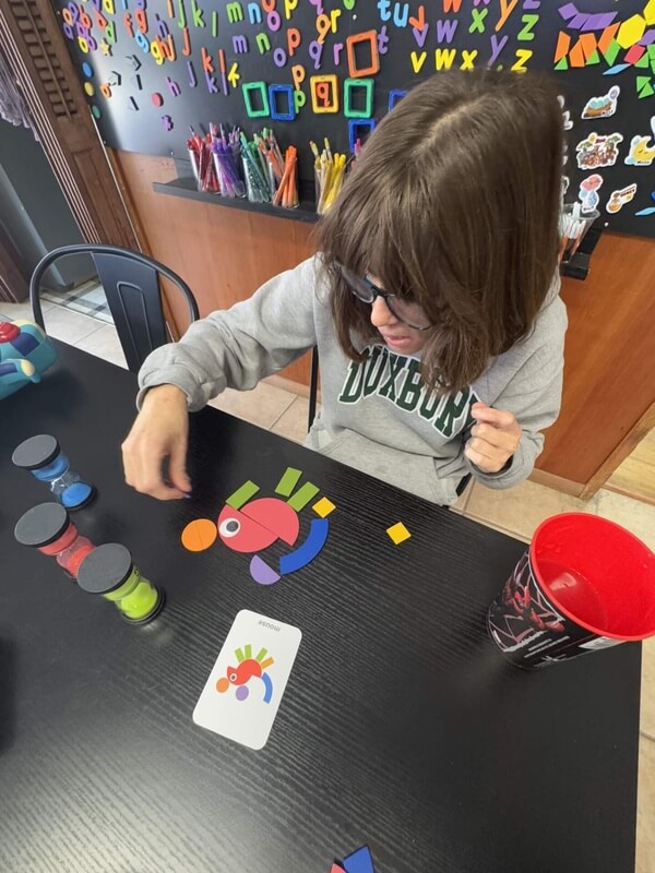 Adults with special needs participating in functional skills activities