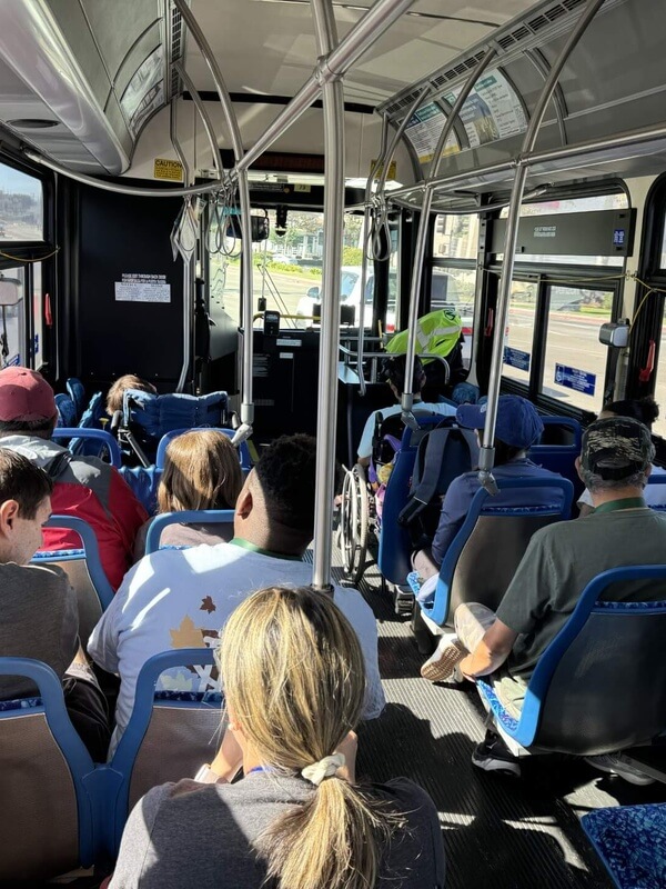 Adult day program participants working on independent living skills