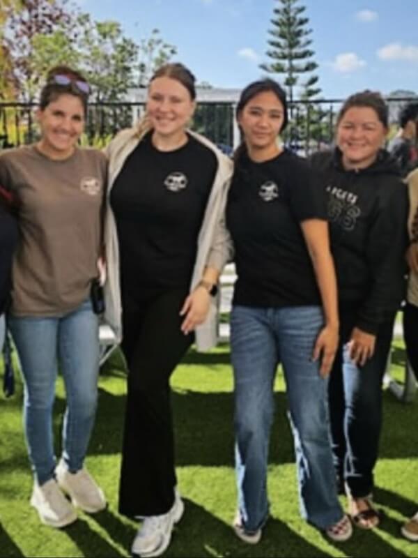 Ivey Ranch Adult Day Program teachers at an outdoor community event in Oceanside. Our team actively participates in local activities and family-friendly programs.