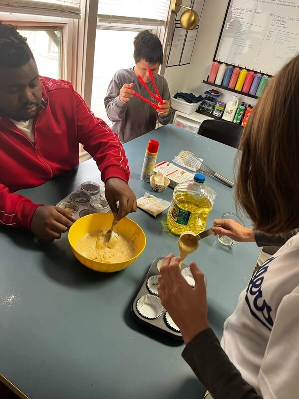 Adults with special needs participating in functional skills activities