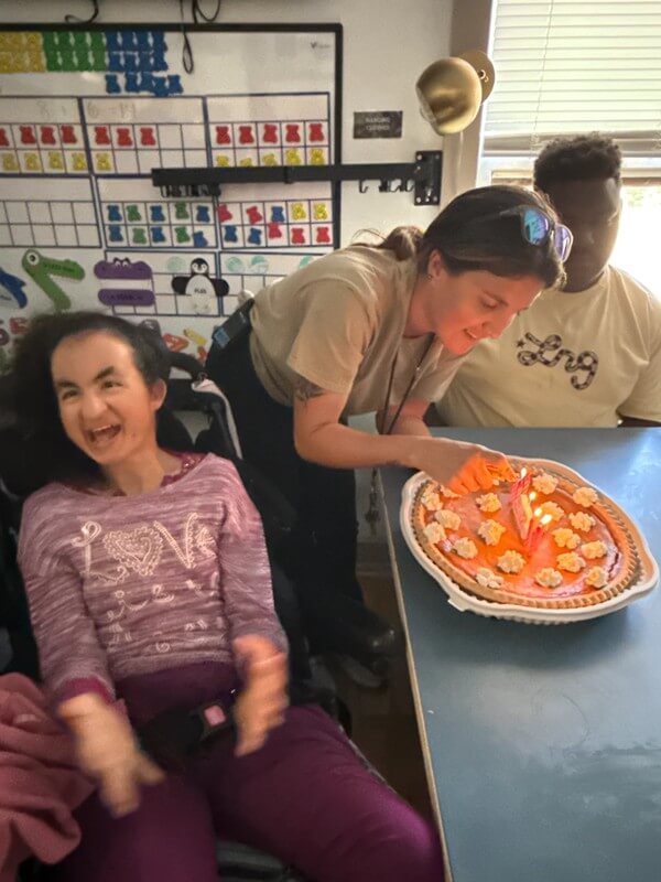 Two participants smiling during cooking activity