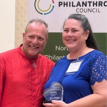 Kim Prince receives the Volunteer of the Year award from the North County Philanthropy Council at Ivey Ranch Park Association