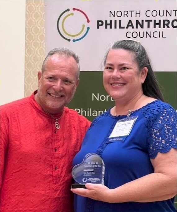 Kim Prince receives the Volunteer of the Year award from the North County Philanthropy Council at Ivey Ranch Park Association