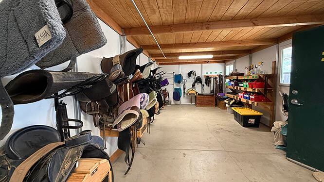 The accessible tack room at Ivey Ranch Park Association, designed for participants using wheelchairs, walkers, and mobility aids in Oceanside, CA
