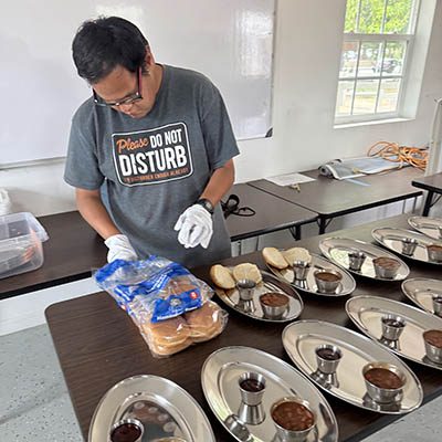 Tailored Day Service participant preparing food for an event at Ivey Ranch in Oceanside, CA