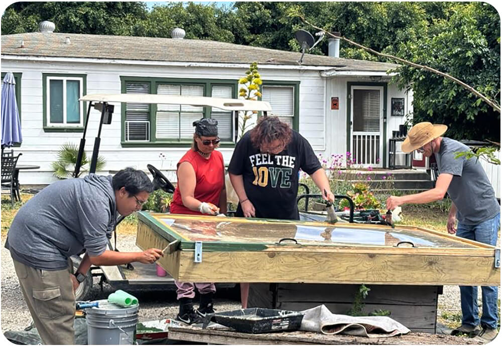 Tailored Day Service participants working on facility maintenance and repairs at Ivey Ranch in Oceanside, CA