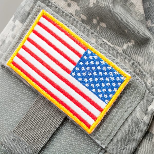 Close-up of an American flag patch on a military uniform, representing the Combined Federal Campaign